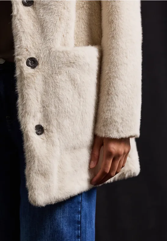 Manteau en fausse fourrure pastel sand