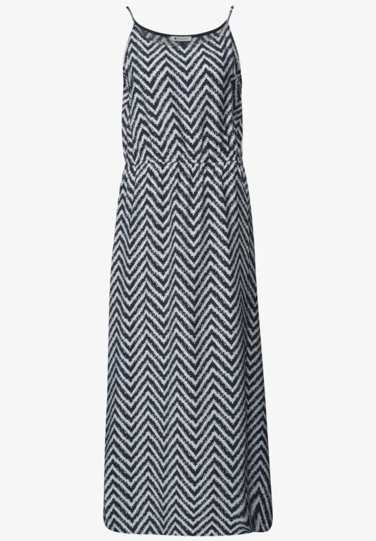 Ärmelloses Maxikleid mit schmalen Trägern und schwarz-weißem Zickzackmuster.