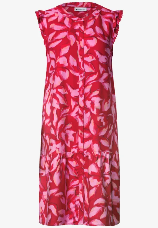Robe midi sans manches rose à motif feuilles claires et coupe ample.