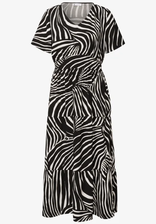 Robe mi-longue manches courtes, col rond, imprimé zèbre contrasté noir et blanc.