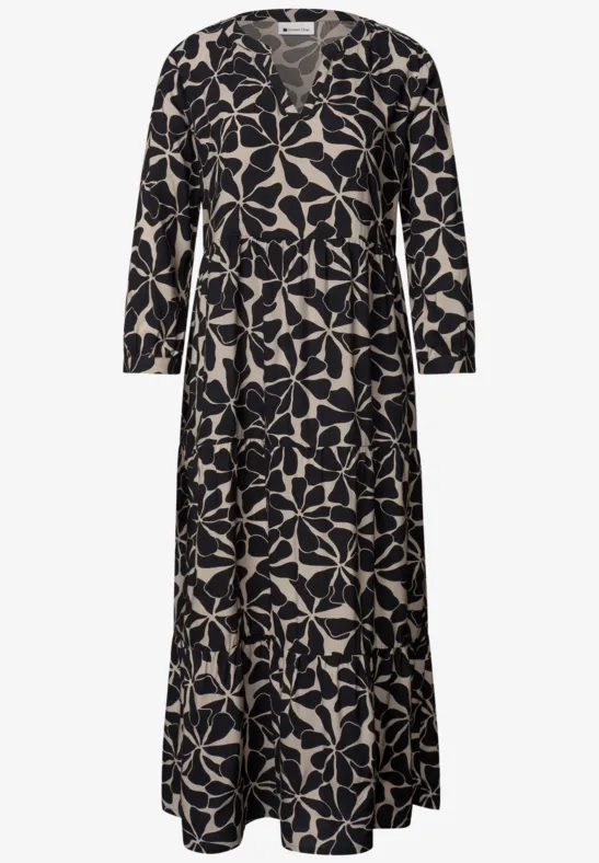 Zwart maxijurk met lange mouwen en beige bladmotief