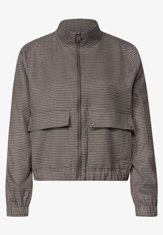 Veste grise à petit motif à carreaux, col montant, fermeture éclair et poches plaquées.