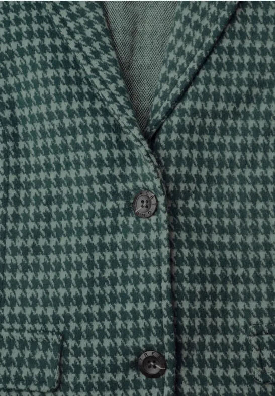 Veste blazer verte à motif pied-de-poule, col revers, deux boutons et poches.