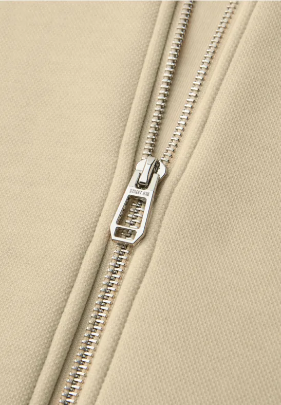 Kort vest met trekkoord smoke beige mel.