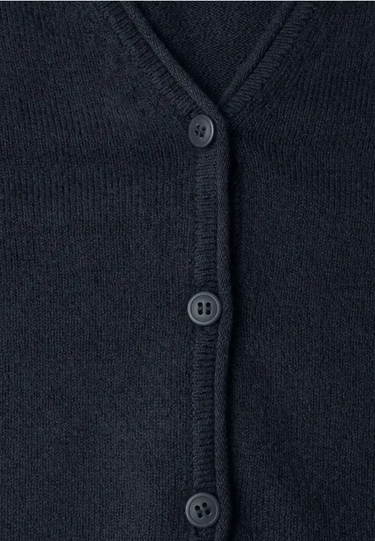 Cardigan en maille bleu foncé à col V et trois boutons.