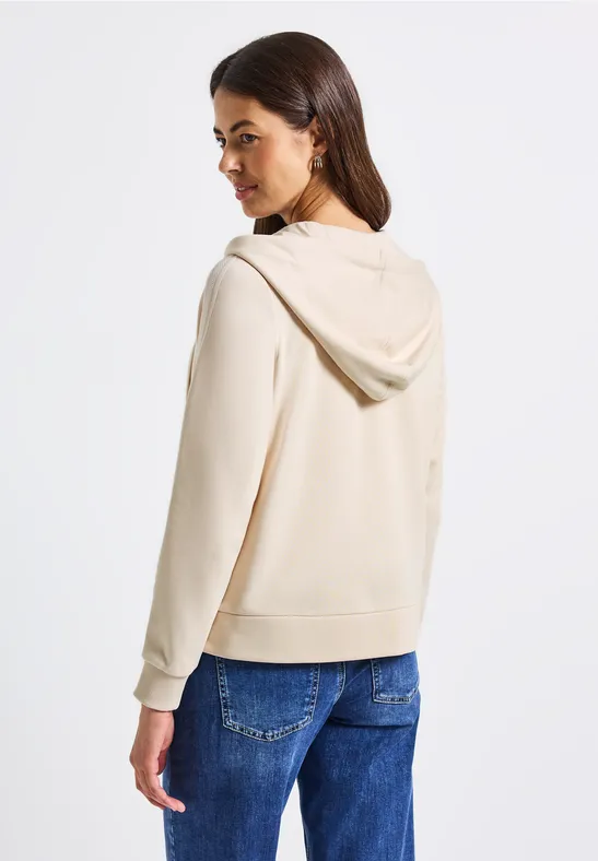 Kapuzenjacke mit Dekotape tusk cream