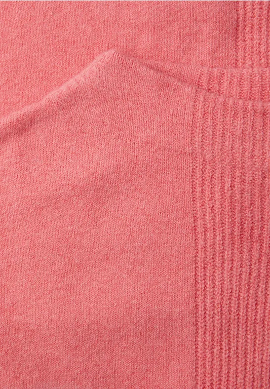 Pull à structure mixte striking coral mel.