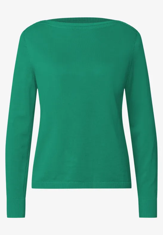 Grüner Pullover mit langen Ärmeln und schlichtem Rundhalsausschnitt.