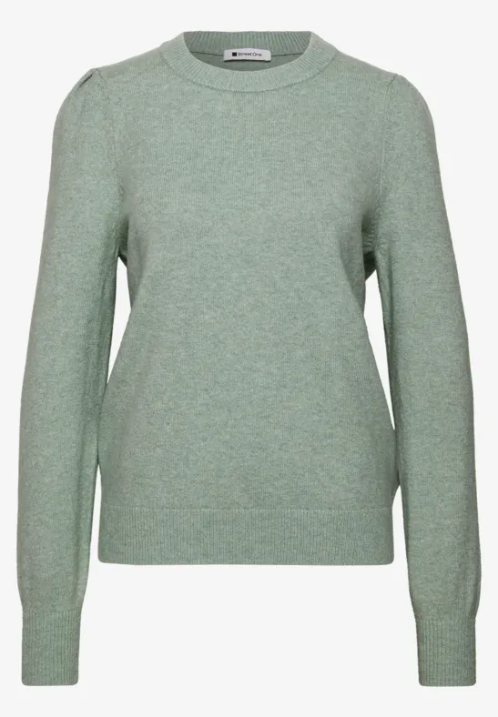 Hellgrüner Pullover mit Rundhalsausschnitt und langen Ärmeln.