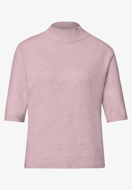 Rosa Kurzarm-Strickpullover mit Rollkragen, weicher Stoff und lockere Passform.