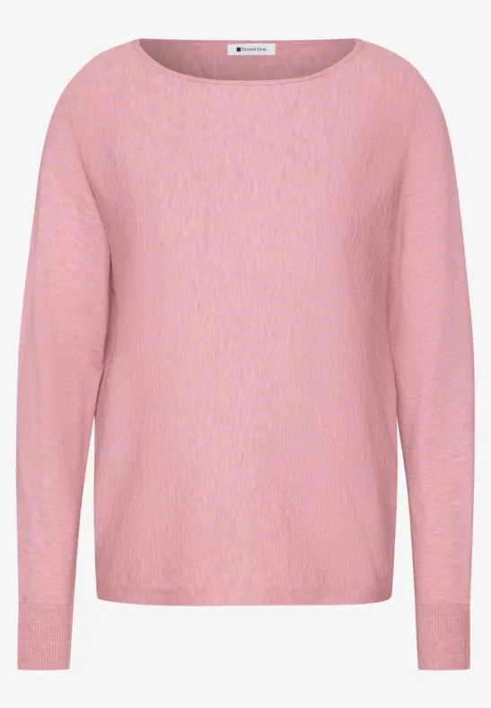 Rosa Pullover mit Rundhalsausschnitt und langen Ärmeln aus weichem Strickstoff.