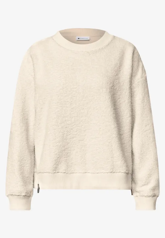 Beige Fleece-Sweatshirt mit Rundhalsausschnitt und langen Ärmeln.