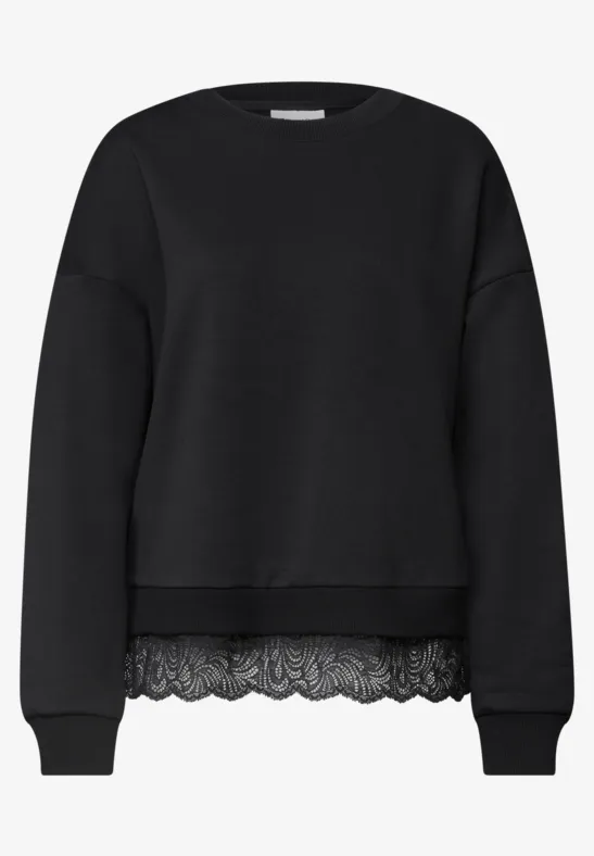 Schwarzer Pullover mit Spitzenbesatz am Saum