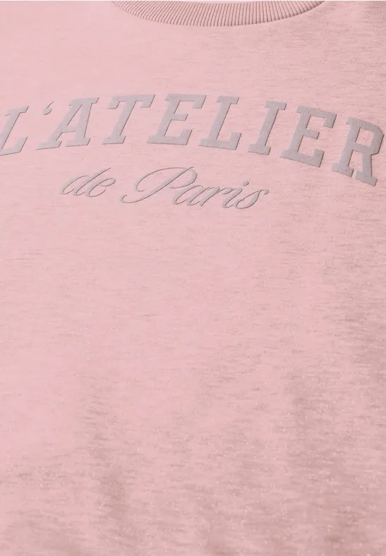 Rosa T-Shirt mit aufgedrucktem Schriftzug 'L'ATELIER de Paris' an der Brust