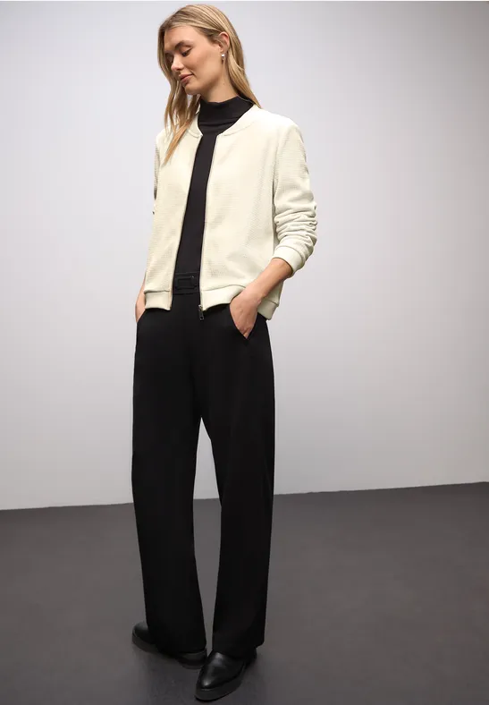 Jasje met glinsterende structuur soft beige