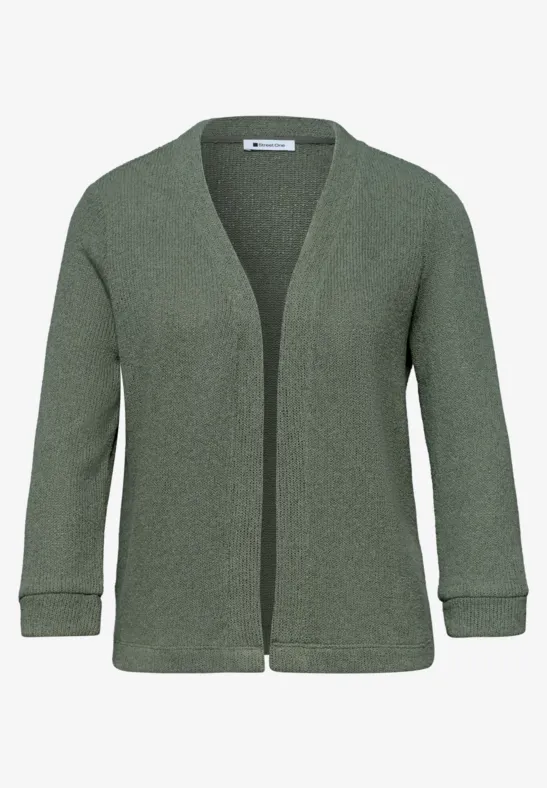 Cardigan ouvert en maille vert olive, manches retroussées et design épuré.
