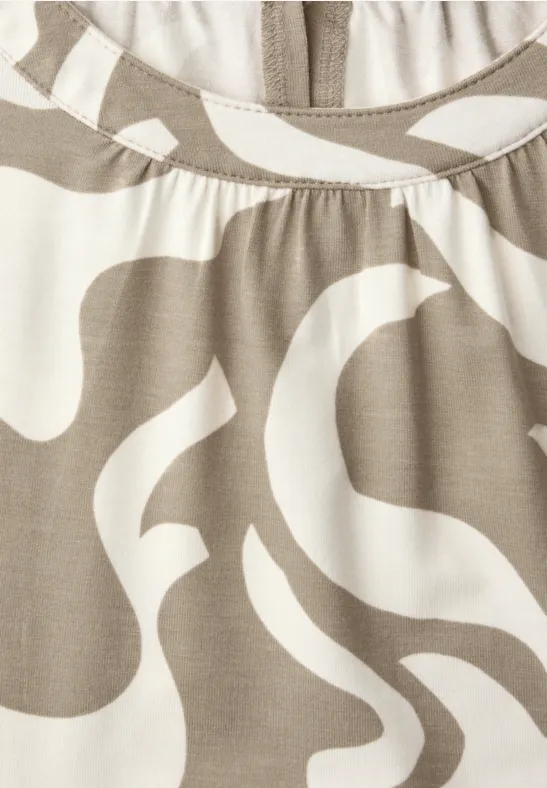 Gedessineerde top timeless beige