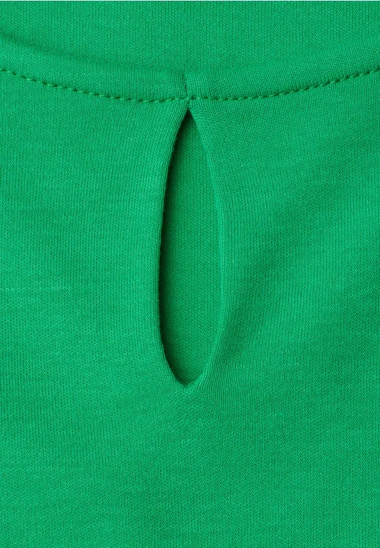 Groen textiel met kleine verticale opening