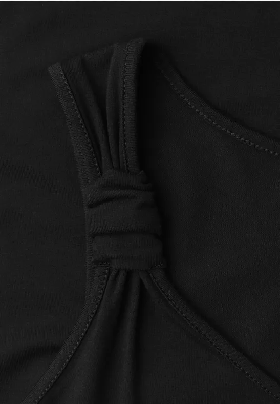 Schwarzer Bikini- oder Bustier-Oberteil mit überkreuzten Trägern und zentralem Knotendetail.