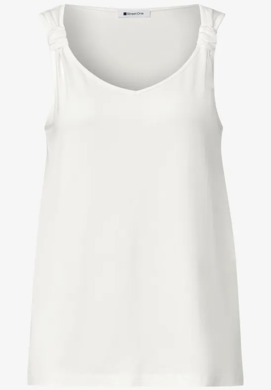 Weißes Tanktop mit U-Ausschnitt und gerüschten Trägern.