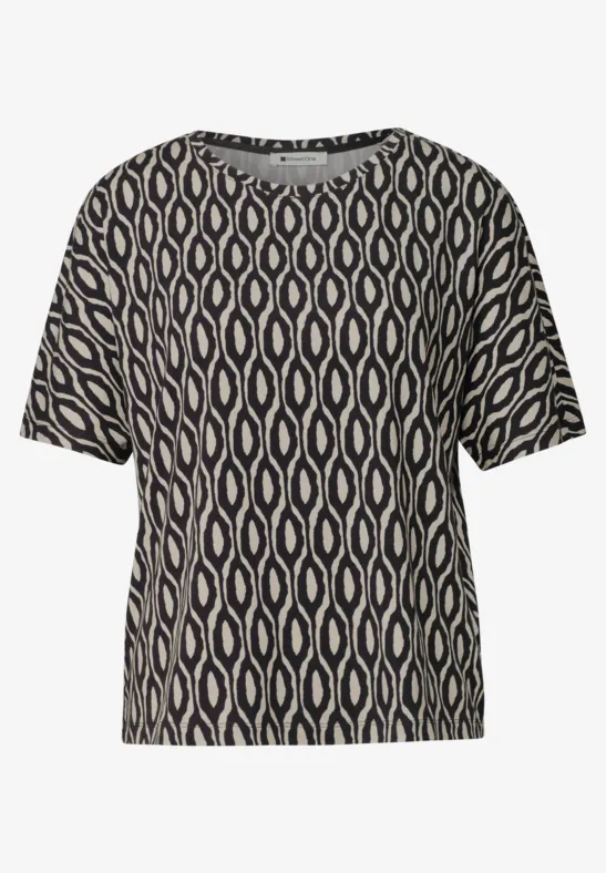 Schwarzes Kurzarmshirt mit beigem, wellenförmigem, grafischem Muster.