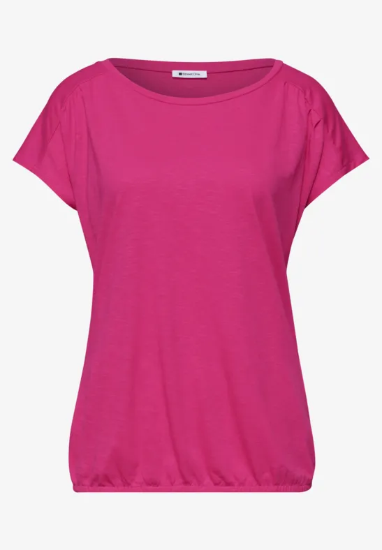 Een eenvoudig, kort mouws dames-T-shirt in fuchsia, met losse pasvorm en ronde hals.