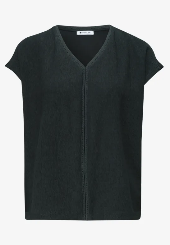 Mouwloze, donkergroene damesgebreide top met V-hals en decoratief middennaad.