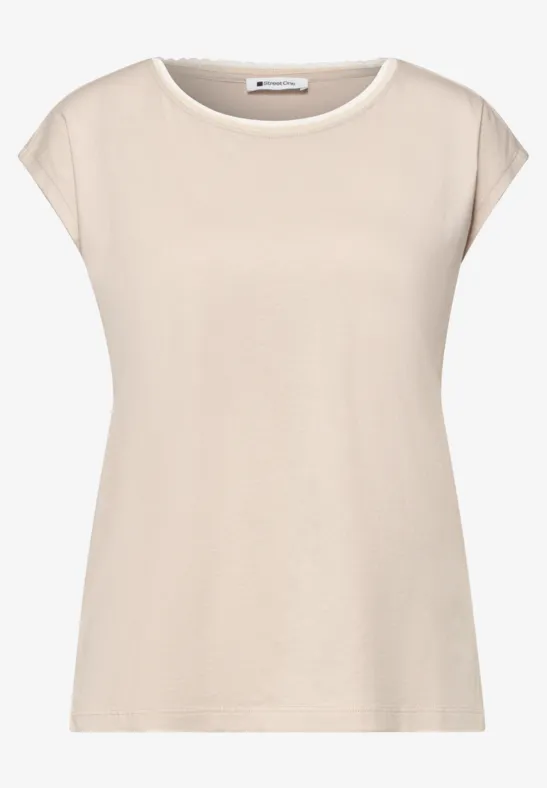 Effen beige dames T-shirt met ronde hals en korte mouwen.