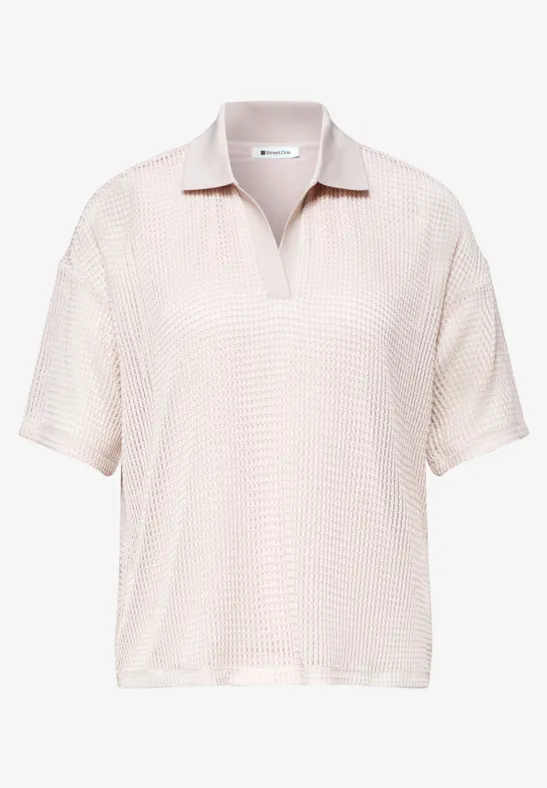 Beige poloshirt met korte mouwen van gestructureerde stof, losse pasvorm