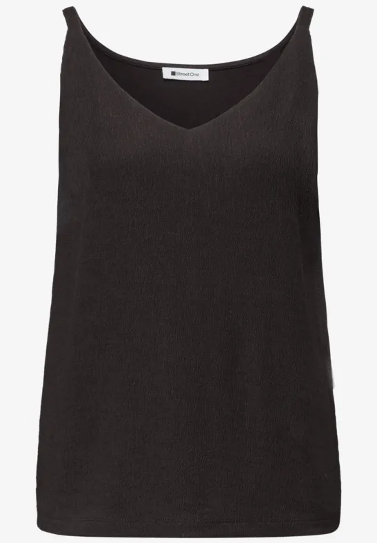 Top noir femme sans manches avec encolure en V et fines bretelles.