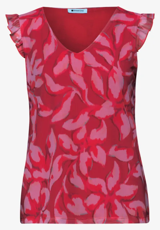 Rotes ärmelloses Top mit pinkem Blumenmuster und Rüschen an den Schultern.