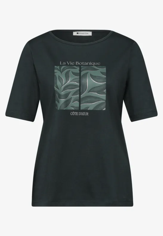 Zwart T-shirt met groen bladmotief in een kader en tekst "La Vie Botanique" en "CÔTE & DAX"