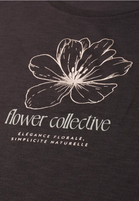 Donker T-shirt met witte schets van een bloem en tekst 'flower collective' en 'Elegance florale, Simplicité naturelle'.
