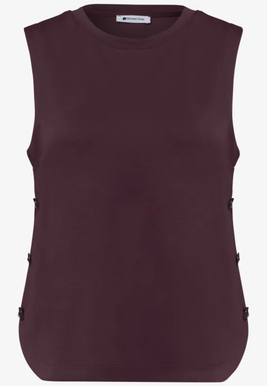 Haut sans manches femme couleur prune foncé, col rond et boutons décoratifs sur les côtés.