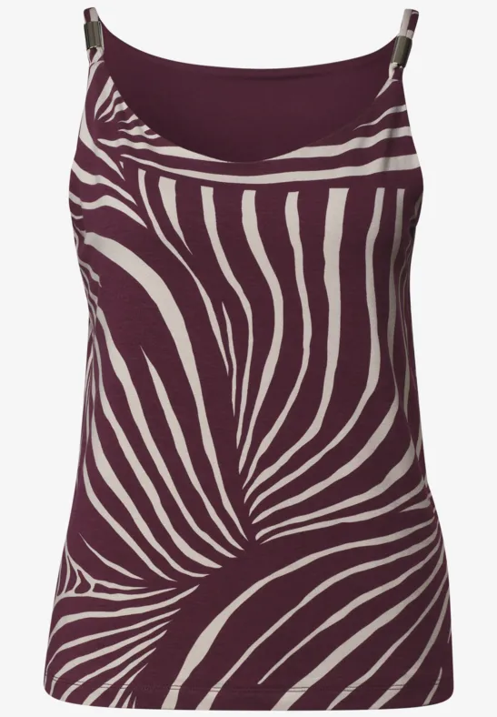 Mouwloos topje met paarse-witte zebraprint.
