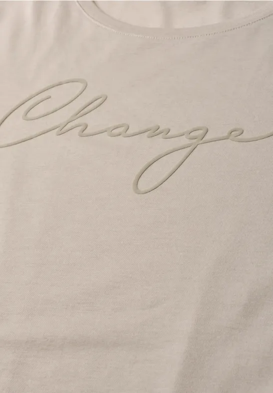 Beiges Shirt mit dem eleganten Schriftzug "Change"