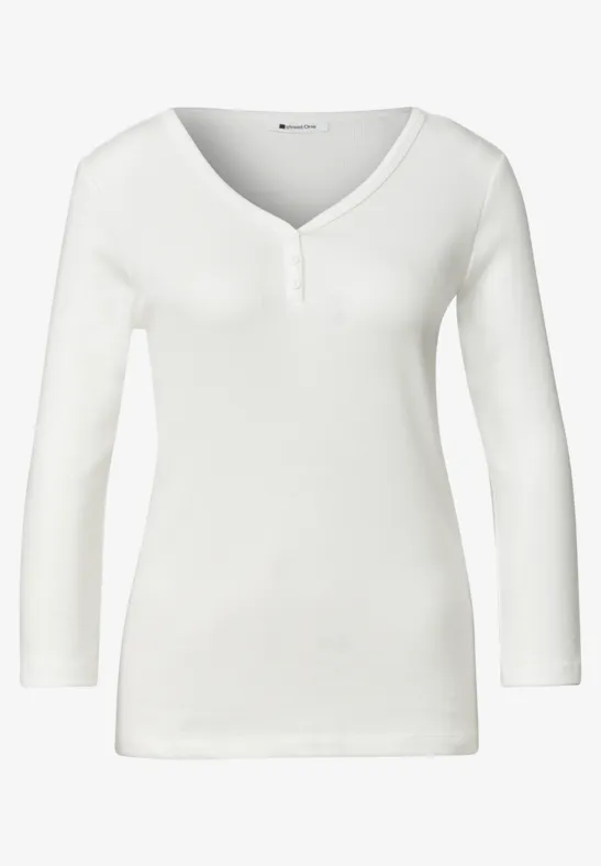 Wit damesshirt met lange mouwen, V-hals en knoopsluiting
