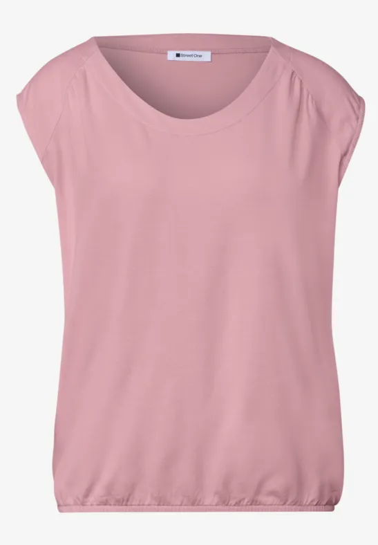 Losvallend, lichtroze T-shirt met korte mouwen, brede ronde hals en elastische zoom.