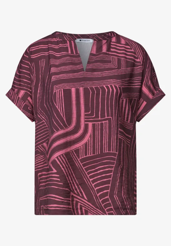 T-shirt manches courtes rose et noir avec motif géométrique et encolure fendue