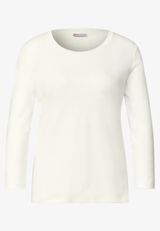 Ein schlichtes weißes Langarmshirt mit Rundhalsausschnitt.