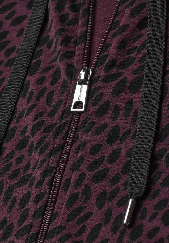 Dunkellila Kapuzenjacke mit schwarzem Leopardenmuster, Reißverschluss und schwarzen Kordeln