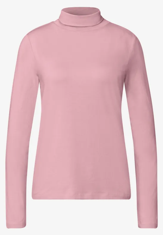 Rosa Rollkragenpullover mit langen Ärmeln und schlichter Optik.