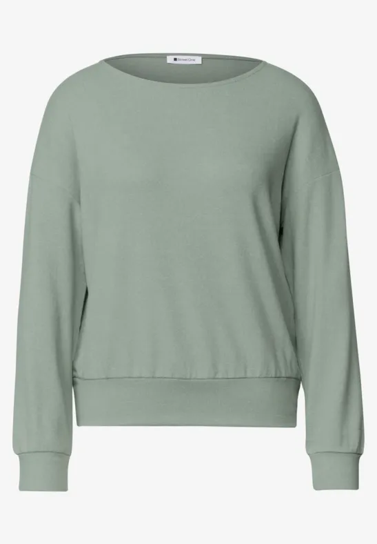 Schlichtes, hellgrünes Sweatshirt mit Rundhalsausschnitt und langen Ärmeln.