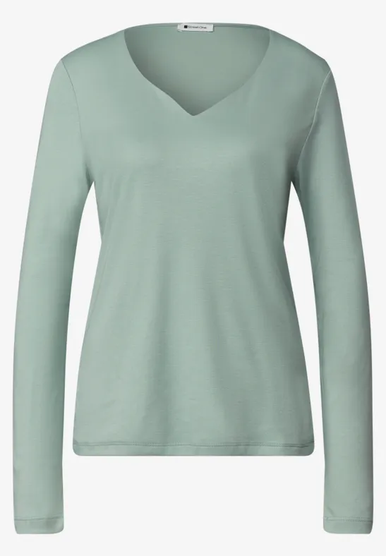 Lichtgroen dameslangarmshirt met V-hals