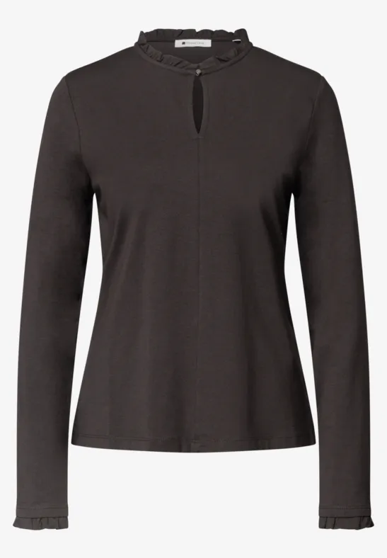 Dunkles Langarmshirt mit femininem Rüschenkragen, kleinem Brustschlitz und feinen Rüschen an Ärmeln und Bund.