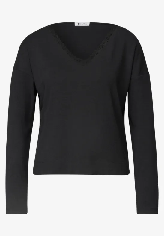 Schwarzer, langärmliger Damenpullover mit V-Ausschnitt und feinem Rippstrick am Saum.