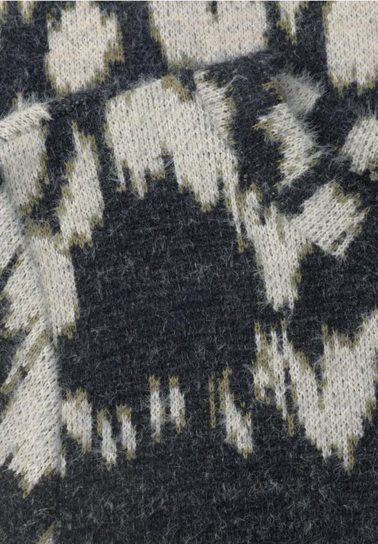 Zwart-witte gebreide stof met een onregelmatig abstract patroon