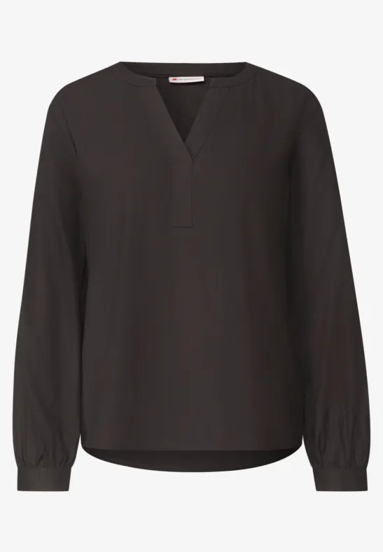 Schwarze, locker sitzende Bluse mit V-Ausschnitt und langen Ärmeln.