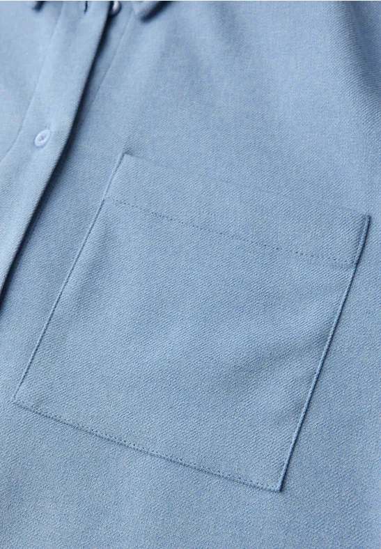 Blouse mélangée avec bande frosted blue mel.