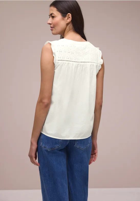 Blousetop met gespleten hals en shiffley-details off white